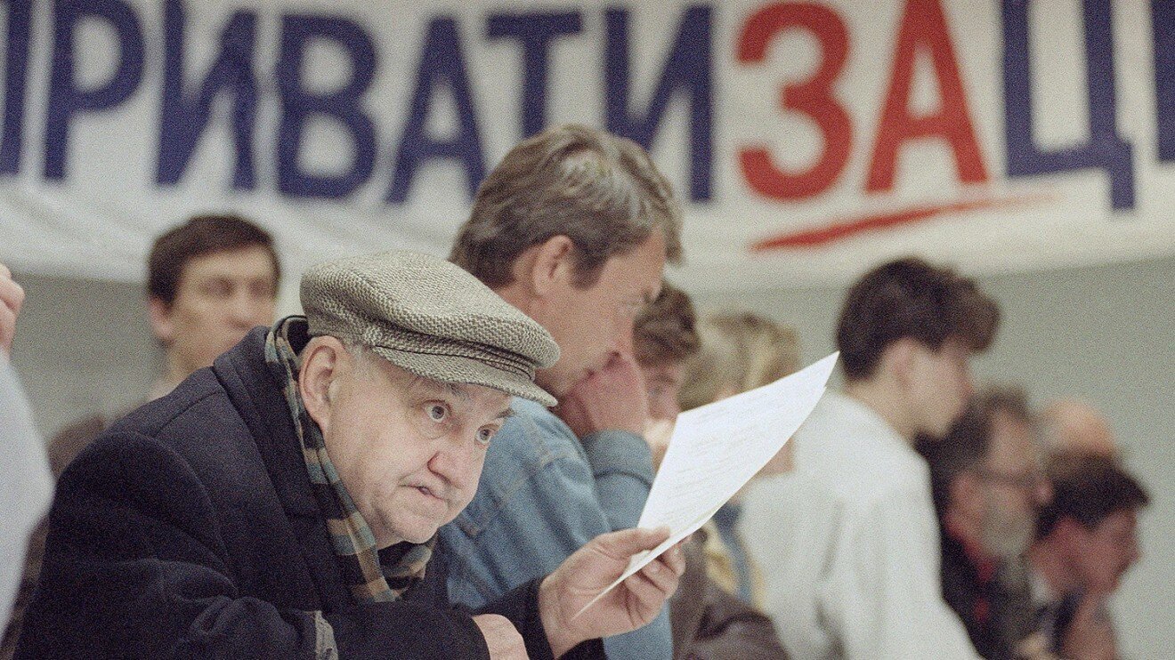 The Voucher Auction